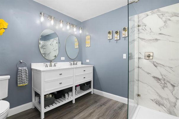 Bathroom, Glass Shower, Interior, Marble Walls, Wood Texture Flooring
