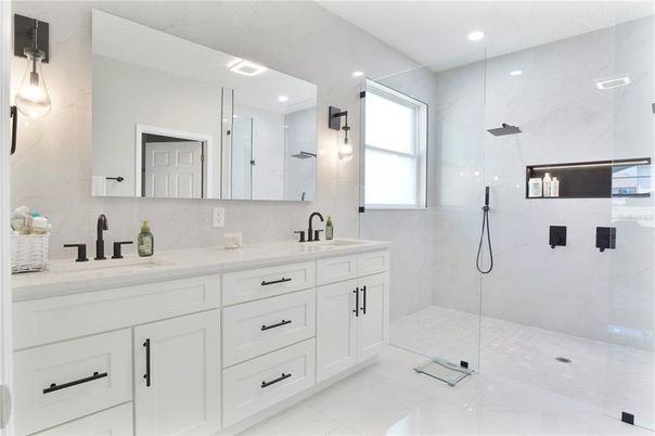 Bathroom, Dual Sink Vanities, Glass Shower, Interior, Marble Walls, Recessed Lighting