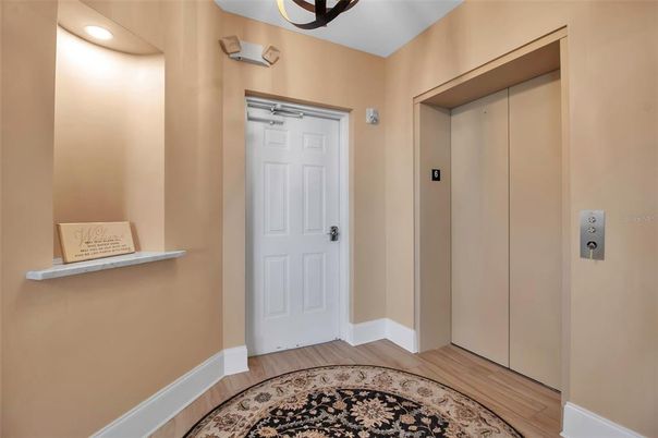 Elevator, Interior, Recessed Lighting, Wood Texture Flooring