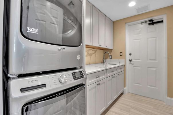 Interior, Kitchen, Recessed Lighting, Washer, Wood Texture Flooring