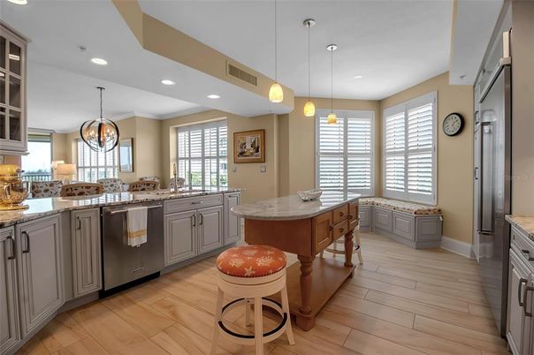 Chandelier, Interior, Kitchen, Pendant Lights, Recessed Lighting, Stainless Steel Appliances, Wood Texture Flooring