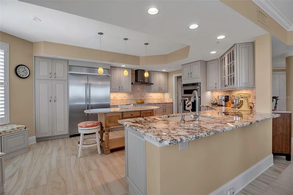 Interior, Kitchen, Marble, Pendant Lights, Recessed Lighting, Stainless Steel Appliances, Wood Texture Flooring