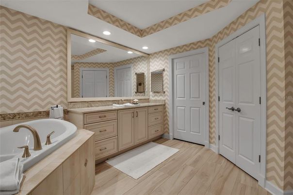 Bathroom, Dual Sink Vanities, Interior, Recessed Lighting, Wood Texture Flooring