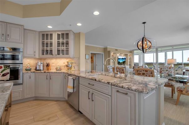 Chandelier, Dining room, Interior, Kitchen, Pendant Lights, Recessed Lighting, Stainless Steel Appliances, Wood Texture Flooring