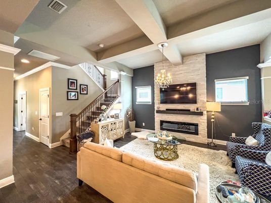 Chandelier, Fireplace, Interior, Living room, Recessed Lighting, Wood Texture Flooring