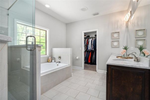 Bathroom, Dual Sink Vanities, Glass Shower, Interior, Recessed Lighting, Walk-in Closets