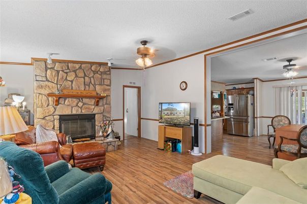 Fireplace, Interior, Kitchen, Living room, Stainless Steel Appliances, Stone Walls, Wood Texture Flooring