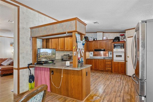 Interior, Kitchen, Stainless Steel Appliances, Wood Texture Flooring