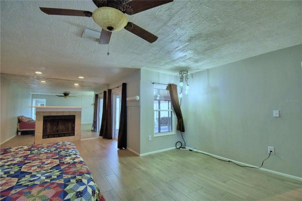 Empty room, Fireplace, Interior, Recessed Lighting, Wood Texture Flooring