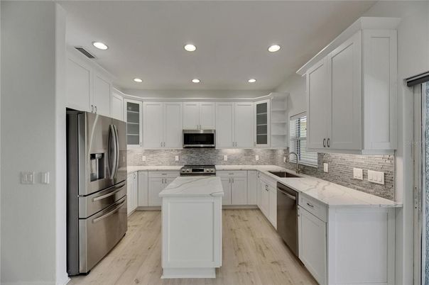 Interior, Kitchen, Recessed Lighting, Stainless Steel Appliances, Wood Texture Flooring