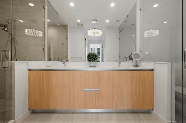 Bathroom, Chandelier, Dual Sink Vanities, Glass Shower, Interior, Recessed Lighting