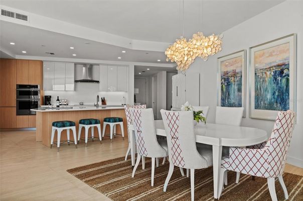 Chandelier, Dining room, Interior, Kitchen, Pendant Lights, Recessed Lighting, Stainless Steel Appliances, Wood Texture Flooring