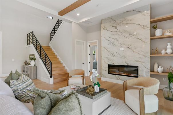 Fireplace, Interior, Living room, Marble Walls, Recessed Lighting, Wooden Beams, Wood Texture Flooring