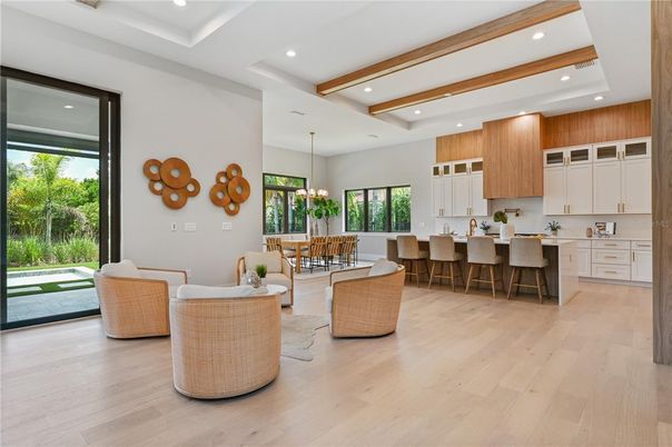 Chandelier, Dining room, Interior, Kitchen, Pendant Lights, Recessed Lighting, Wooden Beams, Wood Texture Flooring