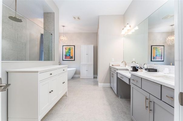 Bathroom, Chandelier, Dual Sink Vanities, Free Standing Baths, Interior, Pendant Lights