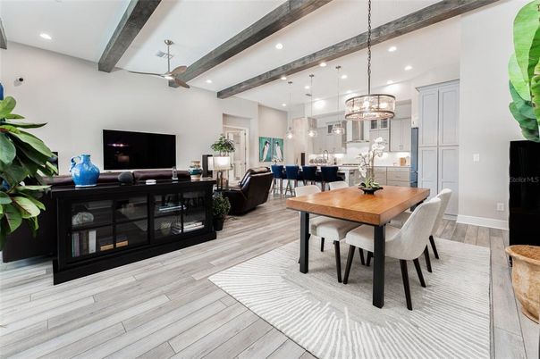 Dining room, Interior, Kitchen, Living room, Pendant Lights, Recessed Lighting, Stainless Steel Appliances, Wooden Beams, Wood Texture Flooring