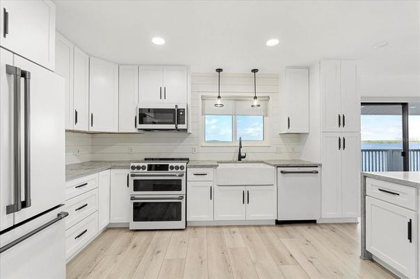 Interior, Kitchen, Pendant Lights, Recessed Lighting, Stainless Steel Appliances, Water, Wood Texture Flooring