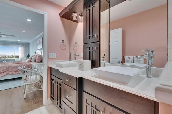 Bathroom, Dual Sink Vanities, Interior, Recessed Lighting, Wood Texture Flooring