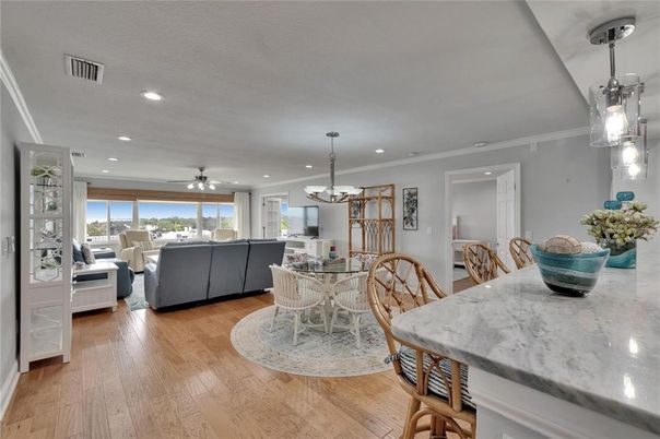 Chandelier, Dining room, Interior, Living room, Pendant Lights, Recessed Lighting, Wood Texture Flooring