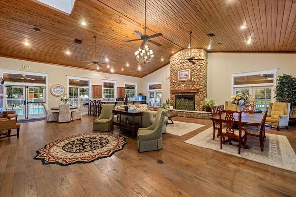 Dining room, Fireplace, Interior, Living room, Pendant Lights, Recessed Lighting, Wooden Ceilings, Wood Texture Flooring