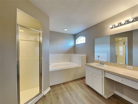 Bathroom, Dual Sink Vanities, Glass Shower, Interior, Recessed Lighting, Wood Texture Flooring