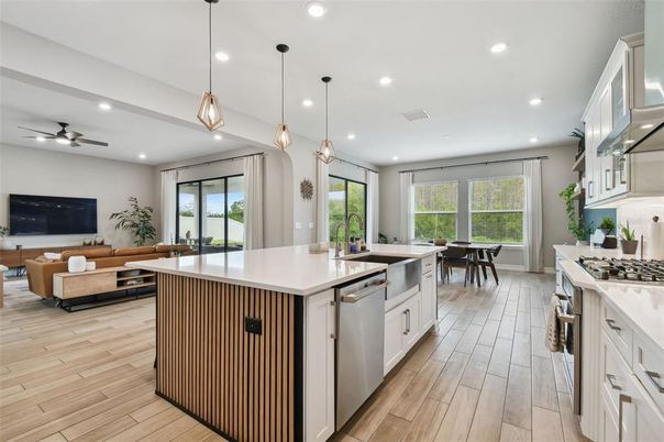 Dining room, Interior, Kitchen, Living room, Pendant Lights, Recessed Lighting, Stainless Steel Appliances, Wood Texture Flooring