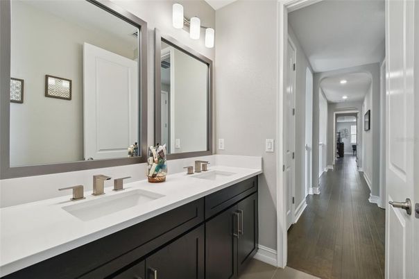 Bathroom, Dual Sink Vanities, Interior, Recessed Lighting, Wood Texture Flooring
