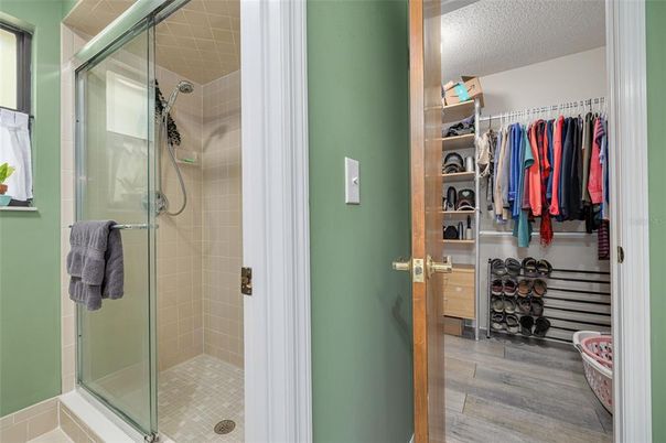 Bathroom, Glass Shower, Interior, Walk-in Closets, Wood Texture Flooring