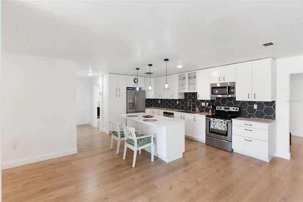 Interior, Kitchen, Pendant Lights, Stainless Steel Appliances, Wood Texture Flooring
