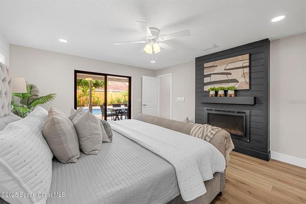 Bedroom, Fireplace, Interior, Recessed Lighting, Wood Texture Flooring