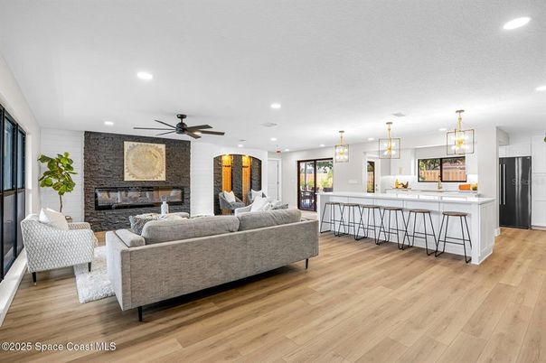 Fireplace, Interior, Kitchen, Living room, Pendant Lights, Recessed Lighting, Stone Walls, Wood Texture Flooring