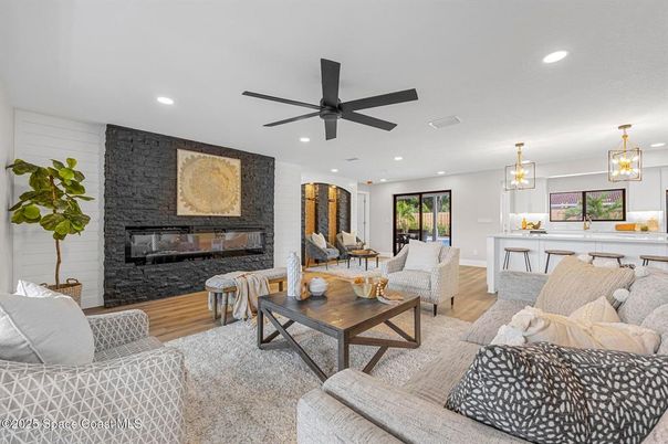 Dining room, Fireplace, Interior, Living room, Pendant Lights, Recessed Lighting, Stone Walls, Wood Texture Flooring