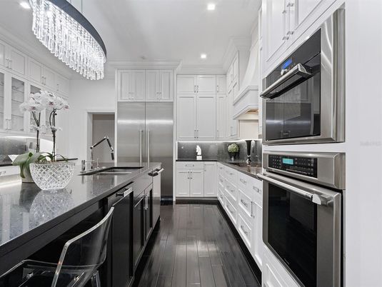 Chandelier, Interior, Kitchen, Recessed Lighting, Stainless Steel Appliances, Wood Texture Flooring