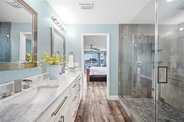 Bathroom, Bedroom, Dual Sink Vanities, Glass Shower, Interior, Wood Texture Flooring