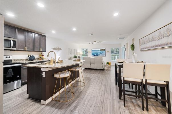 Dining room, Interior, Kitchen, Recessed Lighting, Stainless Steel Appliances, Wood Texture Flooring
