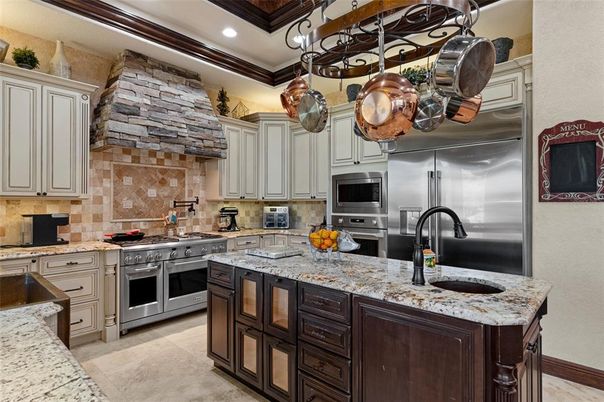 Interior, Kitchen, Recessed Lighting, Stainless Steel Appliances, Stone Walls