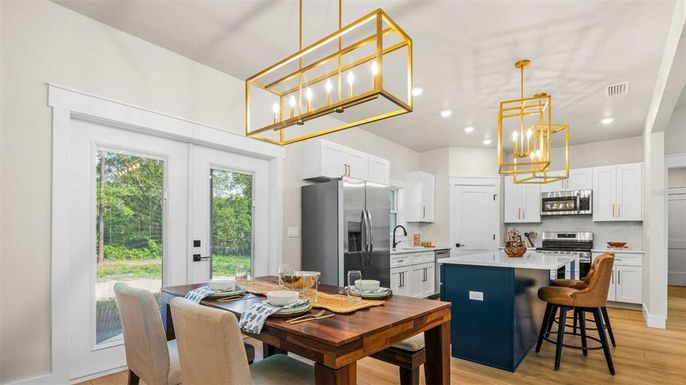 Dining room, Interior, Kitchen, Pendant Lights, Recessed Lighting, Stainless Steel Appliances, Wood Texture Flooring