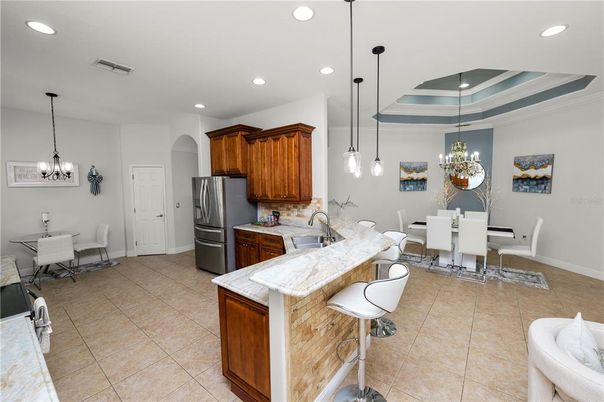 Chandelier, Dining room, Interior, Kitchen, Pendant Lights, Recessed Lighting, Stainless Steel Appliances
