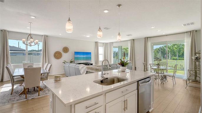 Chandelier, Dining room, Interior, Kitchen, Pendant Lights, Recessed Lighting, Stainless Steel Appliances, Wood Texture Flooring