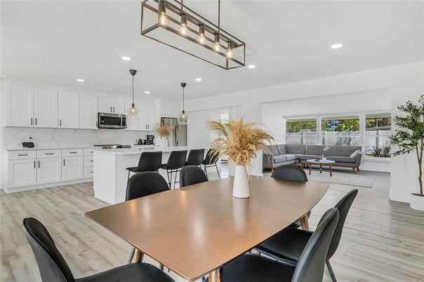 Dining room, Interior, Kitchen, Living room, Marble Walls, Pendant Lights, Recessed Lighting, Wood Texture Flooring