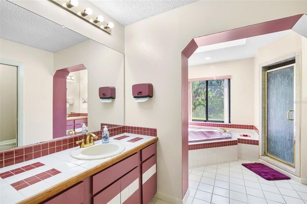 Bathroom, Dual Sink Vanities, Interior, Recessed Lighting, Tile Countertops