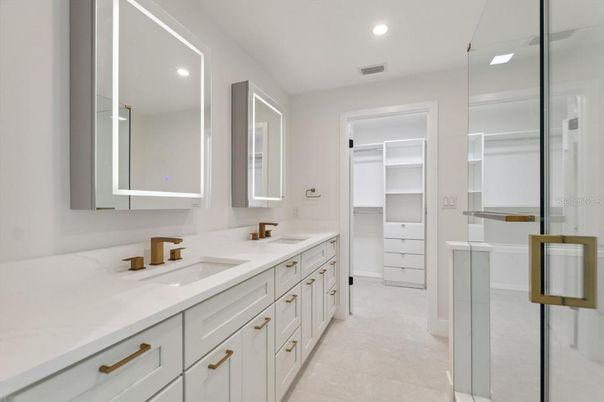 Bathroom, Dual Sink Vanities, Interior, Recessed Lighting, Walk-in Closets