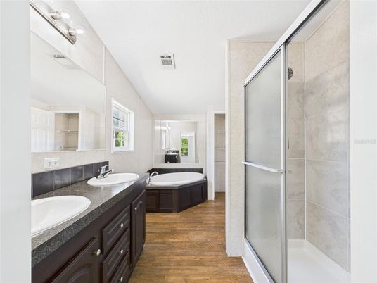 Bathroom, Dual Sink Vanities, Glass Shower, Interior, Wood Texture Flooring