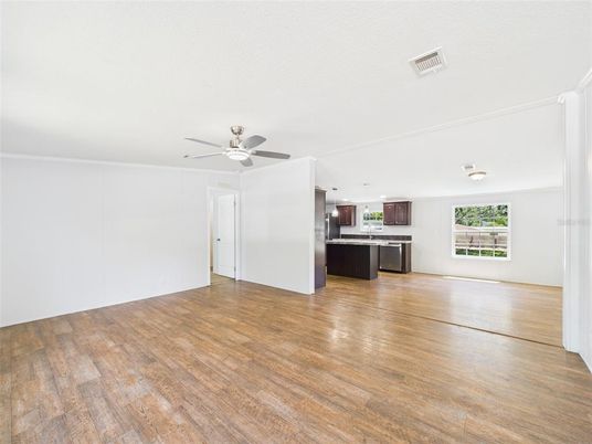 Empty room, Interior, Kitchen, Stainless Steel Appliances, Wood Texture Flooring