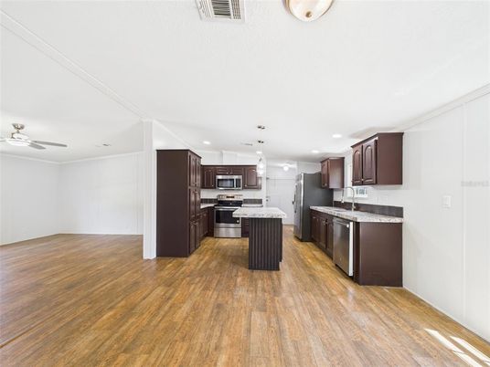 Interior, Kitchen, Pendant Lights, Recessed Lighting, Stainless Steel Appliances, Wood Texture Flooring