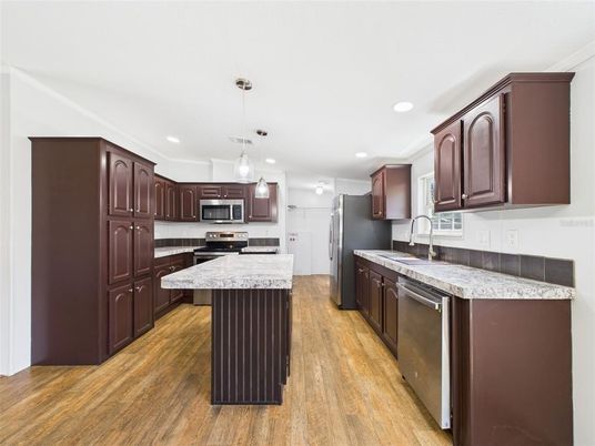 Interior, Kitchen, Pendant Lights, Recessed Lighting, Stainless Steel Appliances, Wood Texture Flooring