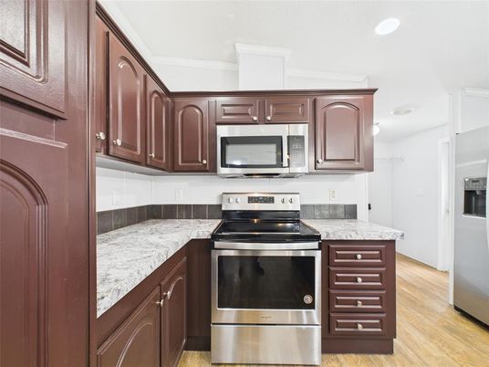 Interior, Kitchen, Recessed Lighting, Stainless Steel Appliances, Wood Texture Flooring