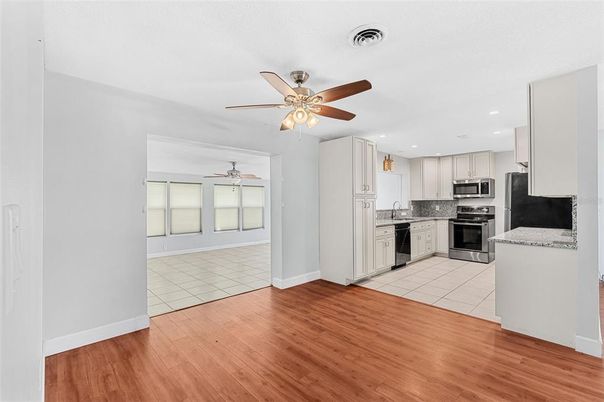 Interior, Kitchen, Recessed Lighting, Stainless Steel Appliances, Wood Texture Flooring
