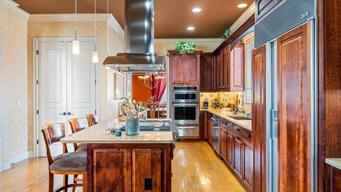 Dining room, Interior, Kitchen, Pendant Lights, Recessed Lighting, Stainless Steel Appliances, Wood Texture Flooring