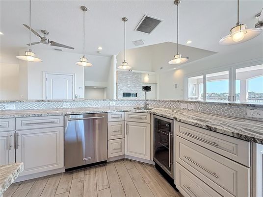 Interior, Kitchen, Pendant Lights, Recessed Lighting, Stainless Steel Appliances, Wood Texture Flooring